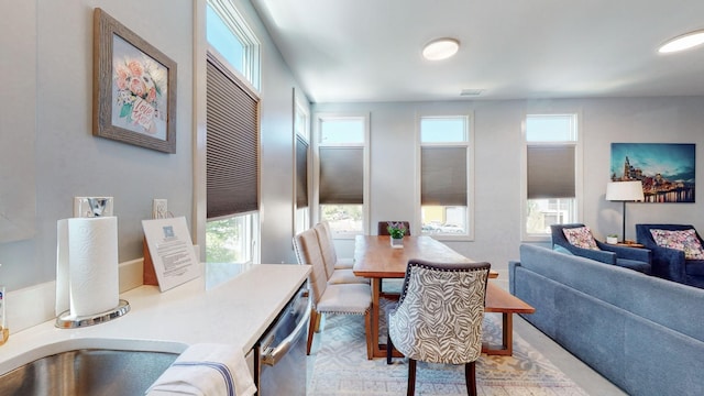 dining area with plenty of natural light