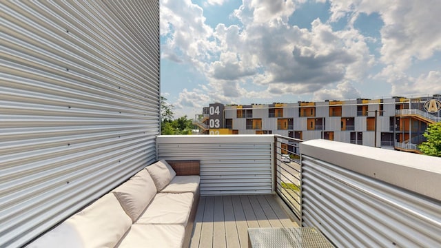 balcony with an outdoor hangout area