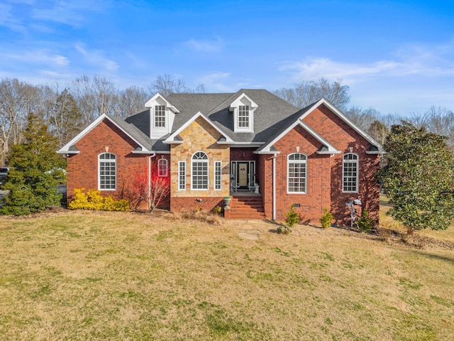 view of property featuring a front yard