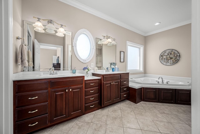 bathroom with tile patterned flooring, ornamental molding, vanity, and a bathtub