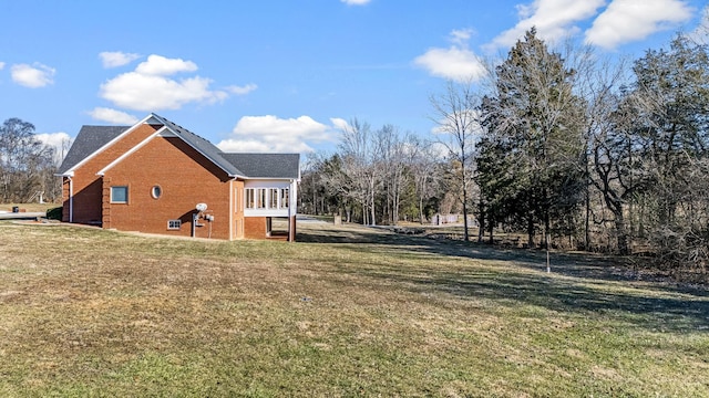 view of property exterior with a lawn