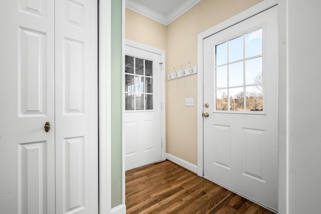 doorway featuring crown molding and dark hardwood / wood-style floors