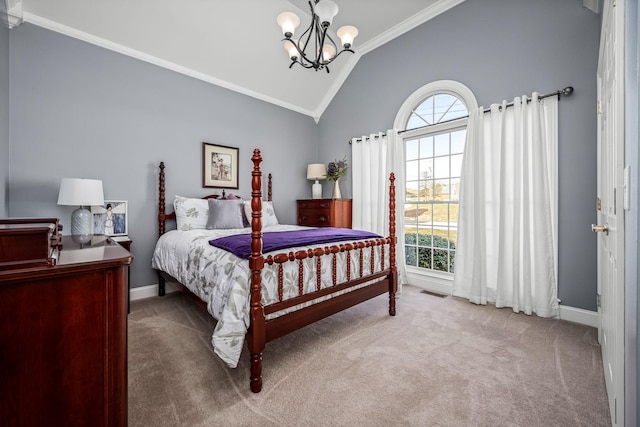 carpeted bedroom with an inviting chandelier, ornamental molding, and vaulted ceiling