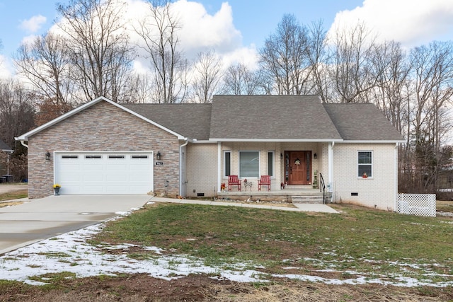 ranch-style home featuring covered porch, a garage, and a lawn