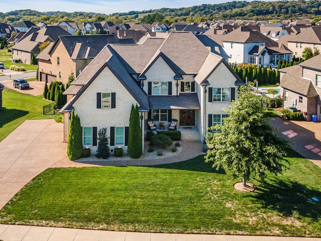 view of front of home with a front yard