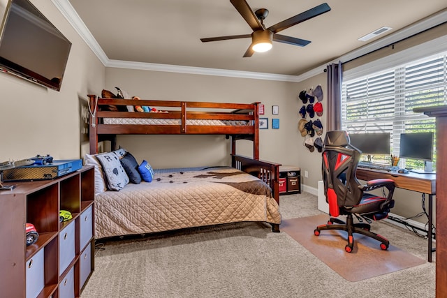 bedroom with ceiling fan, light carpet, and ornamental molding