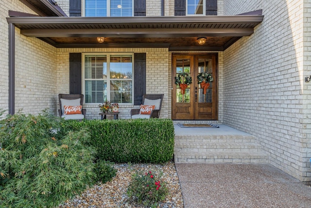 property entrance featuring covered porch