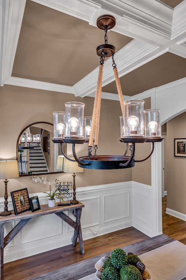 details featuring hardwood / wood-style flooring and crown molding