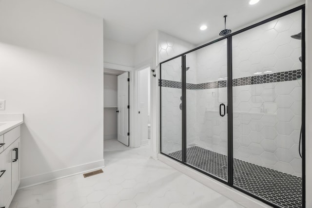 bathroom with vanity and an enclosed shower