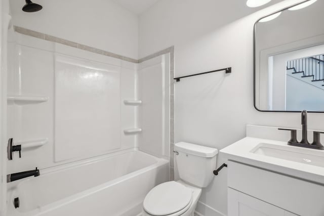 full bathroom with vanity, shower / bathtub combination, and toilet