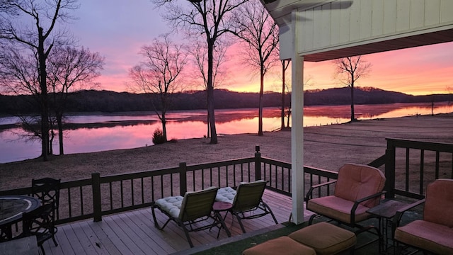 deck at dusk with a water view