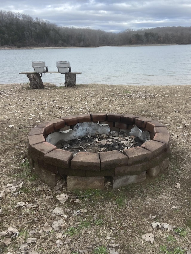 water view with a fire pit