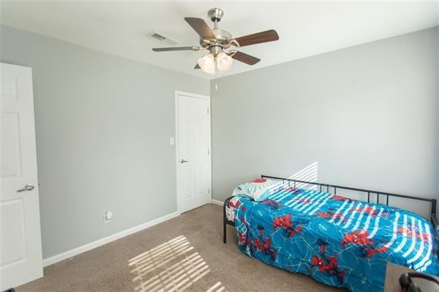 bedroom with carpet flooring and ceiling fan