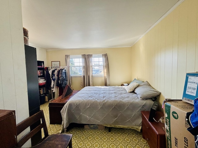 bedroom featuring ornamental molding