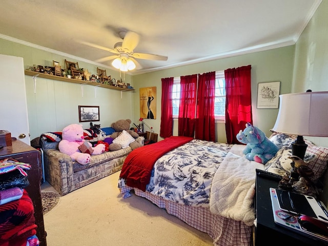 bedroom featuring ceiling fan, ornamental molding, and carpet