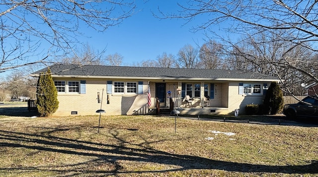 ranch-style house with a front lawn