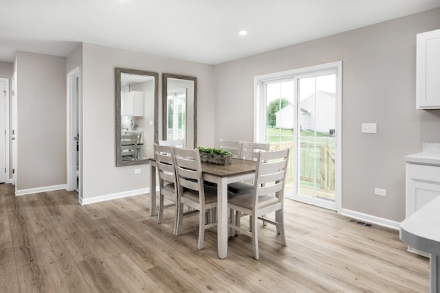 dining area featuring light hardwood / wood-style flooring