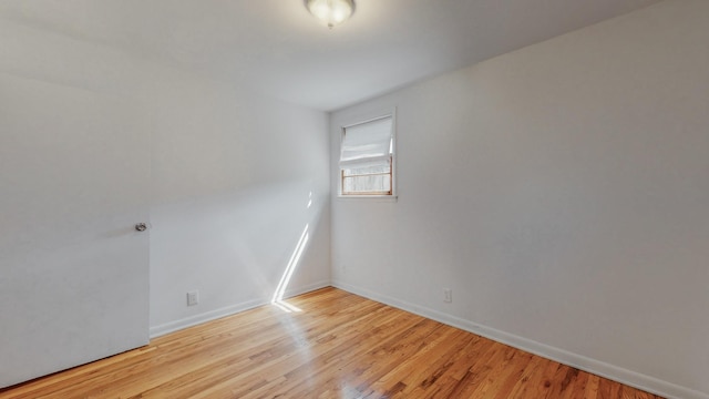 unfurnished room featuring light wood-type flooring