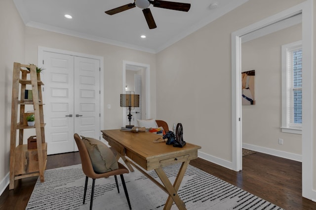 home office featuring dark wood-type flooring, crown molding, and ceiling fan