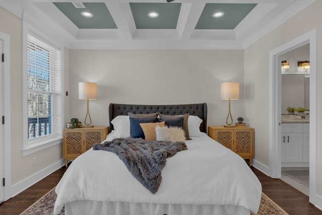 bedroom with ensuite bathroom, coffered ceiling, dark hardwood / wood-style floors, ornamental molding, and beam ceiling