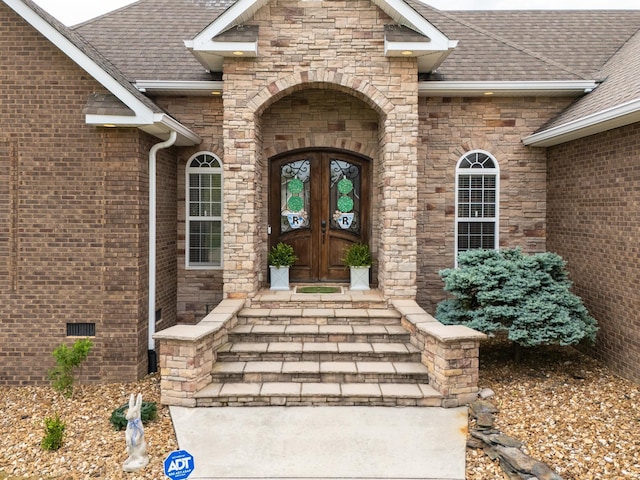 doorway to property featuring french doors