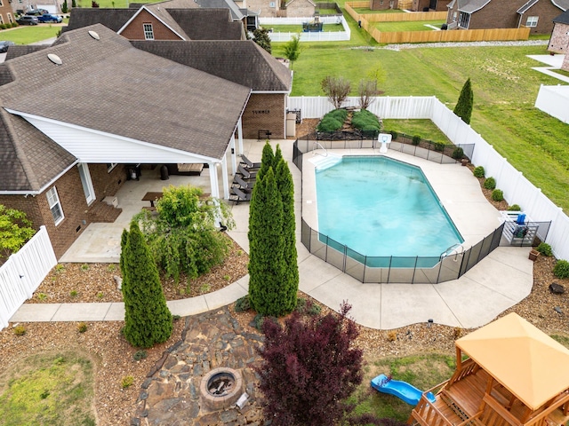 view of pool with a gazebo, a patio, and a playground