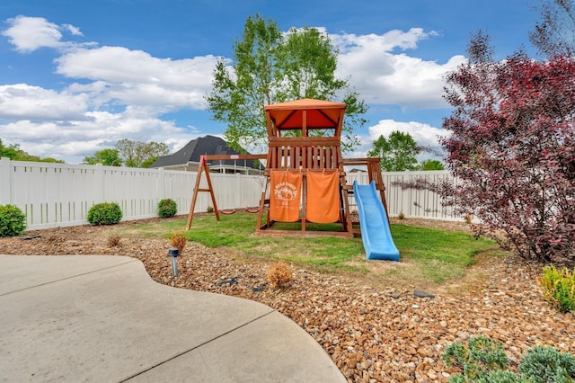 view of play area featuring a yard