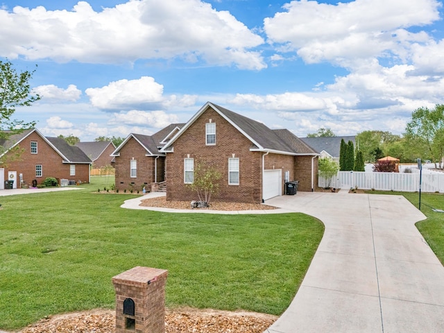 view of front facade featuring a garage and a front lawn