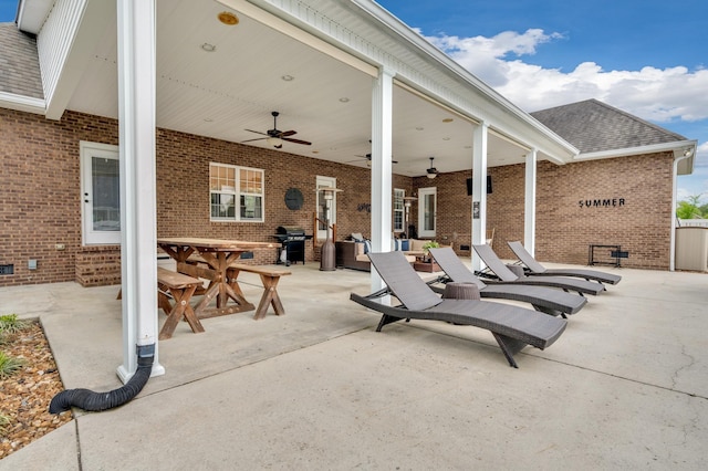 view of patio / terrace with ceiling fan and area for grilling