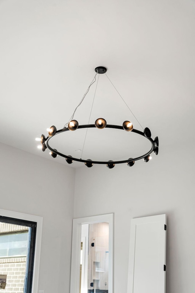 interior details with an inviting chandelier