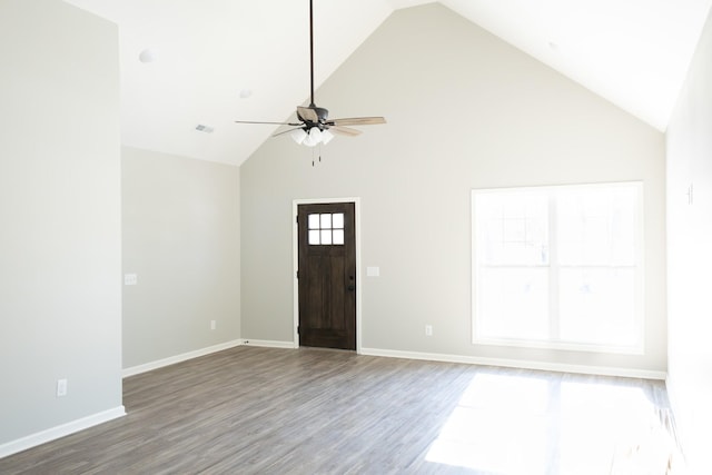 interior space with hardwood / wood-style floors, high vaulted ceiling, and ceiling fan