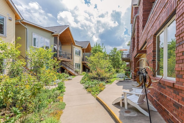 surrounding community featuring a patio