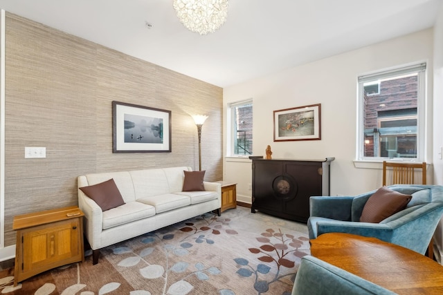 living room with a notable chandelier