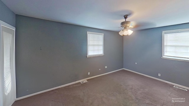 unfurnished room with carpet