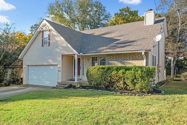 view of front facade featuring a front yard and a garage