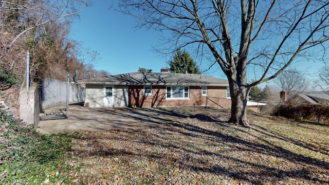 rear view of property with a patio area