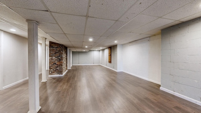 basement featuring wood-type flooring