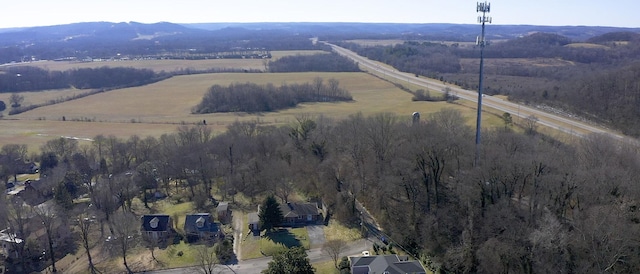 drone / aerial view with a mountain view and a rural view