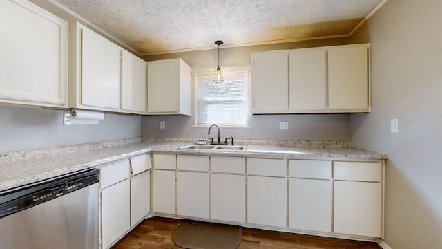 kitchen featuring dishwasher, sink, white cabinets, pendant lighting, and dark hardwood / wood-style flooring