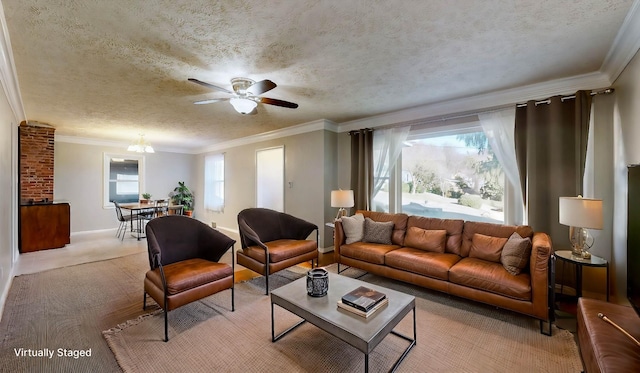 carpeted living room featuring a textured ceiling, ceiling fan, and ornamental molding