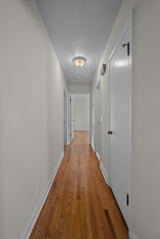 hallway featuring light hardwood / wood-style floors