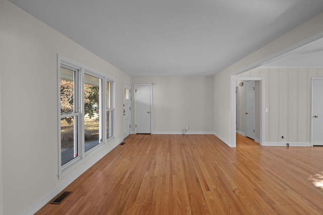 empty room with light wood-type flooring