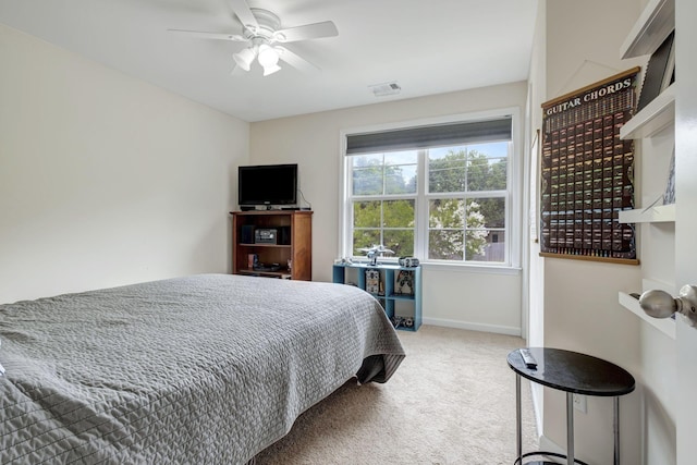 carpeted bedroom featuring ceiling fan