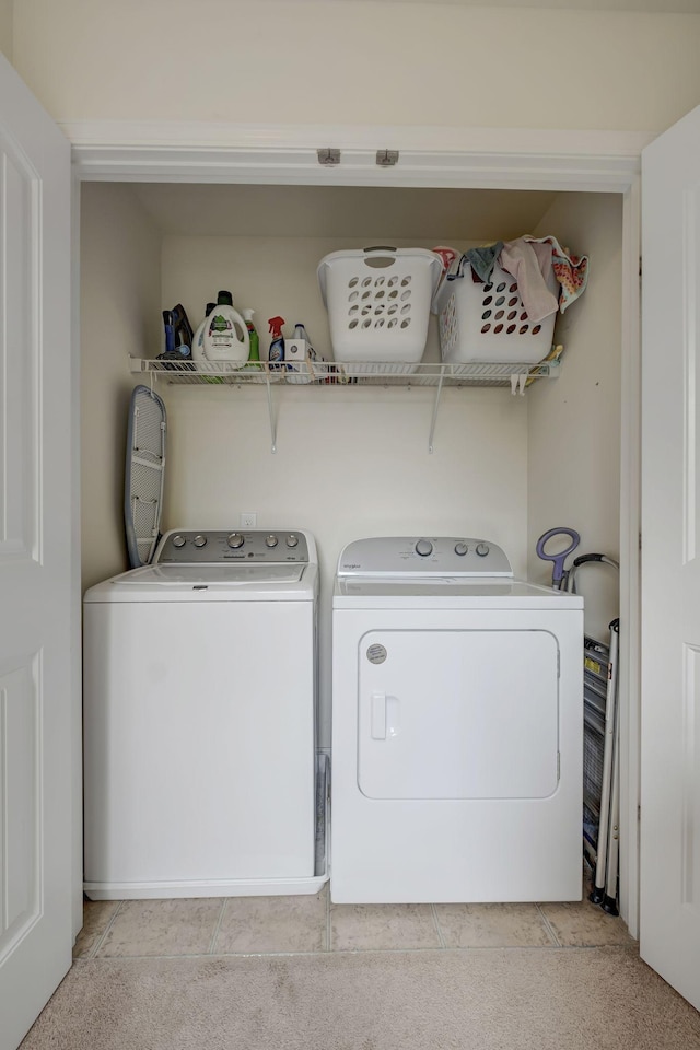 washroom with separate washer and dryer