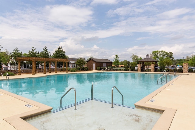 view of pool with a gazebo and a pergola