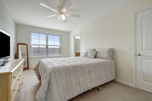 bedroom featuring ceiling fan and light colored carpet