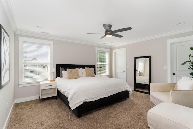 bedroom with carpet flooring, ceiling fan, and ornamental molding