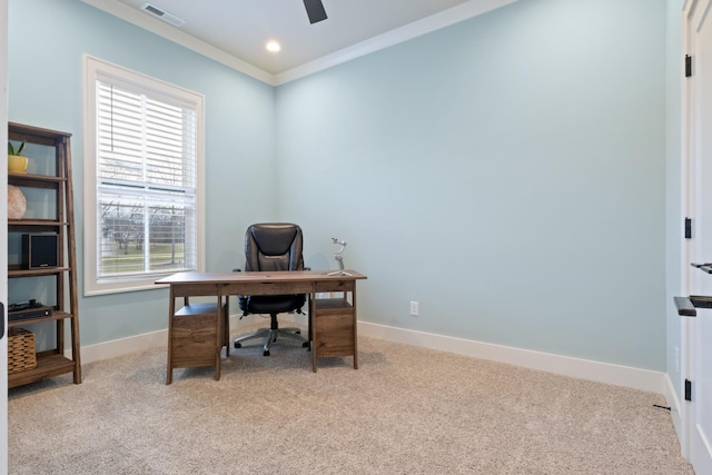 carpeted office space featuring ceiling fan and ornamental molding