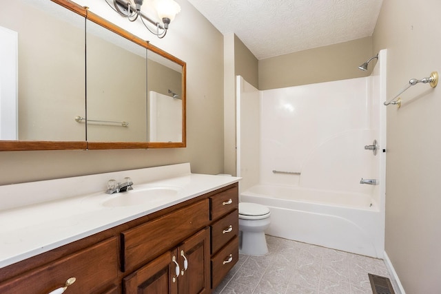 full bath featuring visible vents, shower / bath combination, toilet, vanity, and a textured ceiling