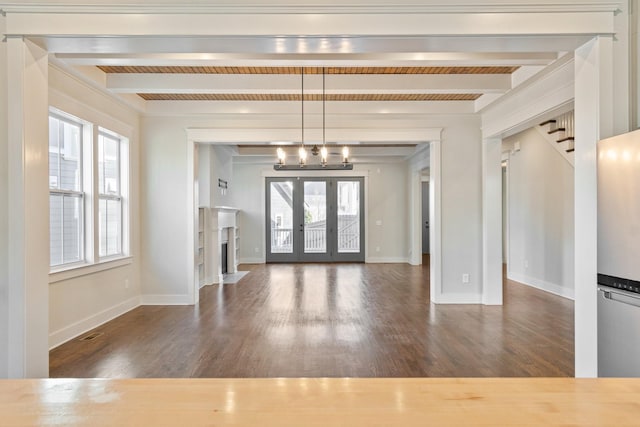 interior space with beam ceiling, dark hardwood / wood-style flooring, french doors, and a notable chandelier